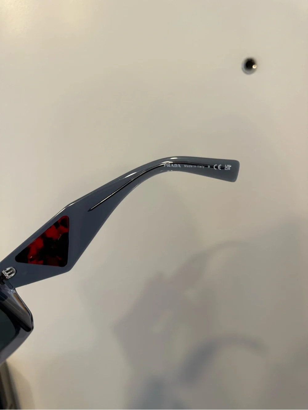 Prada Women’s Square Sunglasses in Translucent Gray with Dark Lenses